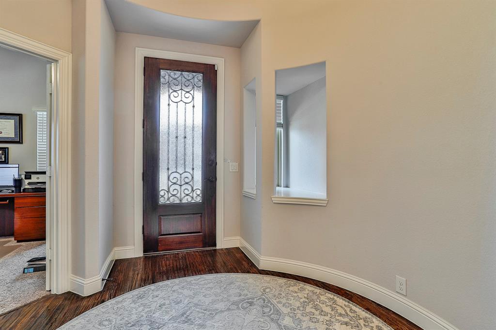 2425 Turning Leaf Lane Midlothian, TX 76065 - Photo 5 of 29 Entryway featuring baseboards and dark wood-type flooring