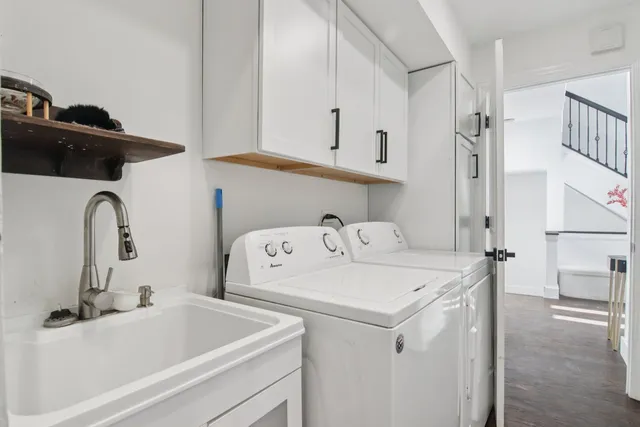 a utility room with dryer and washer