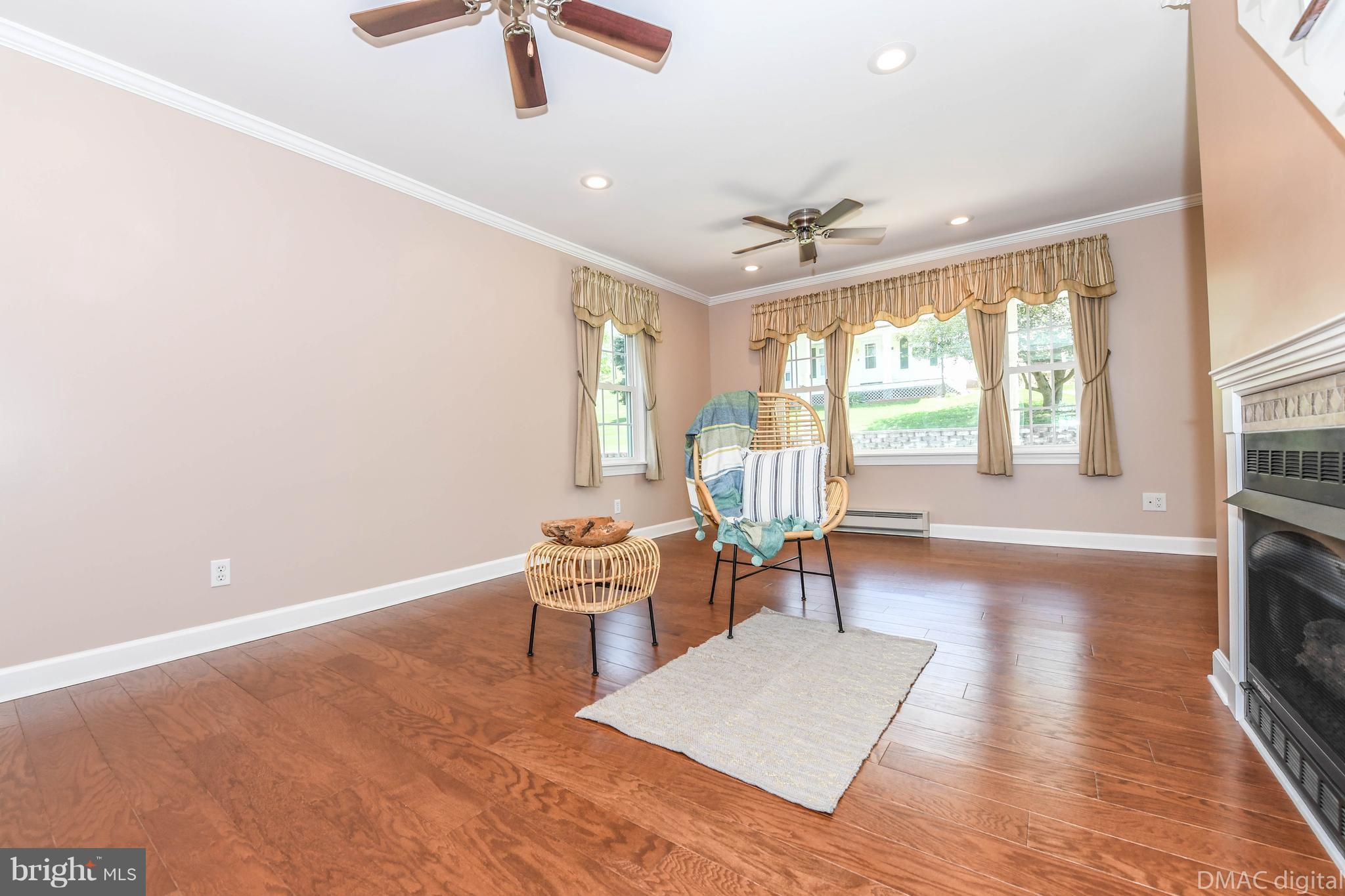 6316 Clevelandtown Road Boonsboro, MD 21713 - Photo 8 of 30 a living room with furniture a table and a large window
