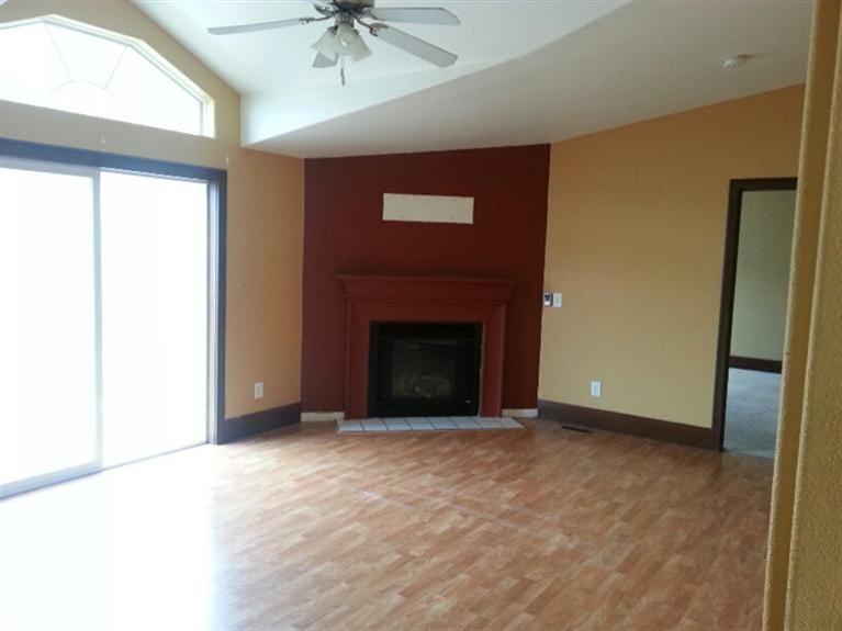102 Cut Throat Loop Gypsum, CO 81637 - Photo 3 of 5 a view of an empty room with a fireplace