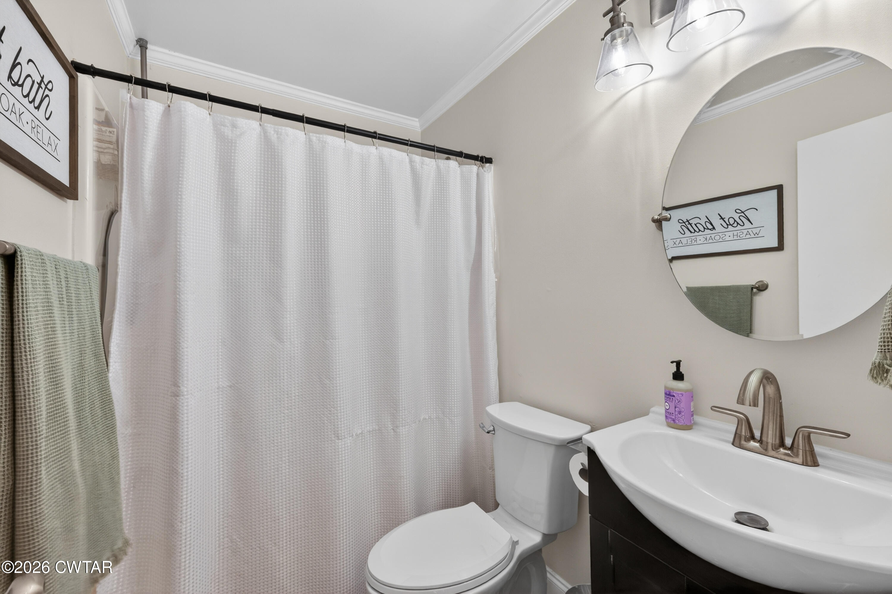 778 Mifflin Road Jackson, TN 38301 - Photo 16 of 23 a bathroom with a sink and a mirror