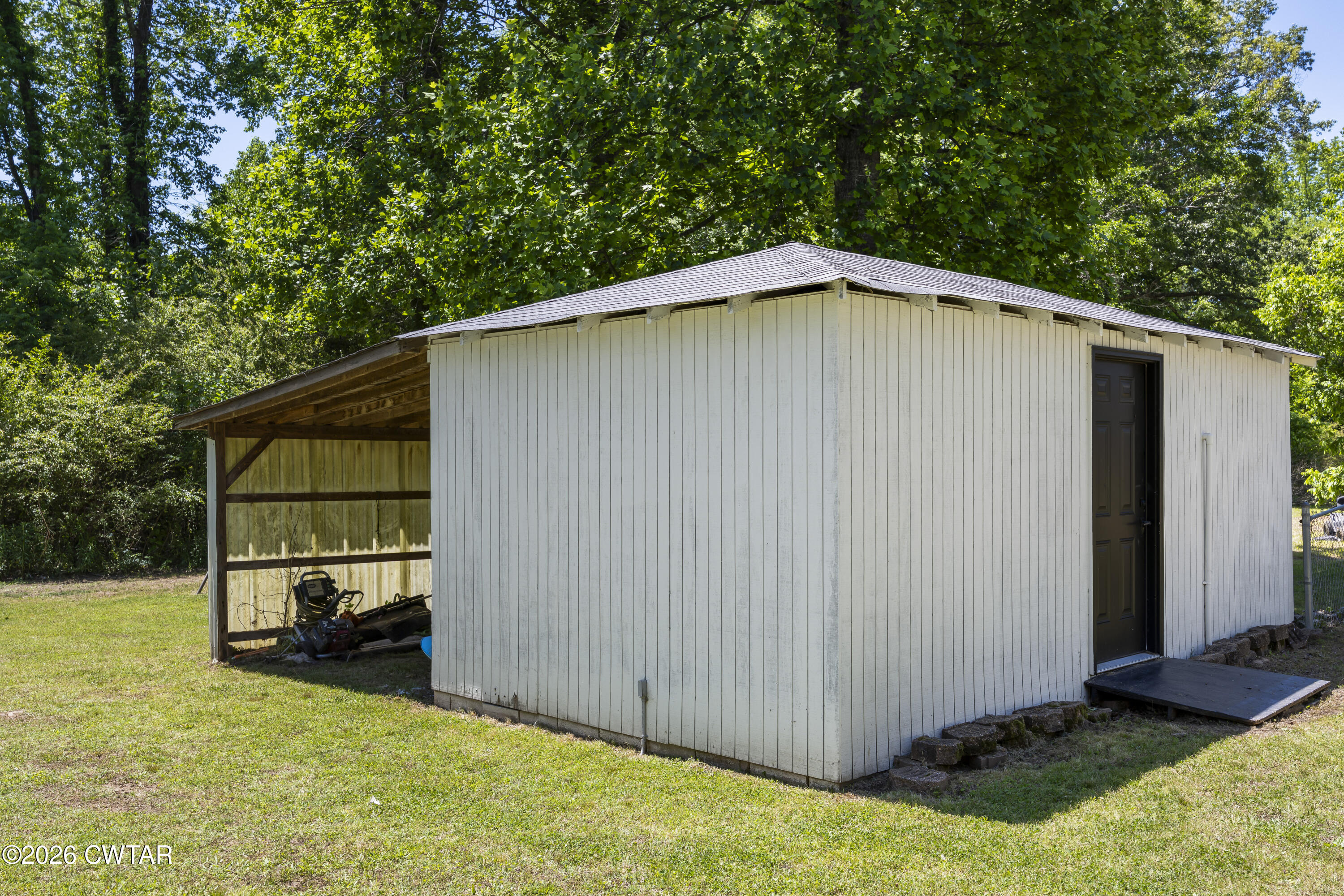 778 Mifflin Road Jackson, TN 38301 - Photo 23 of 23 a backyard of a house with wooden fence