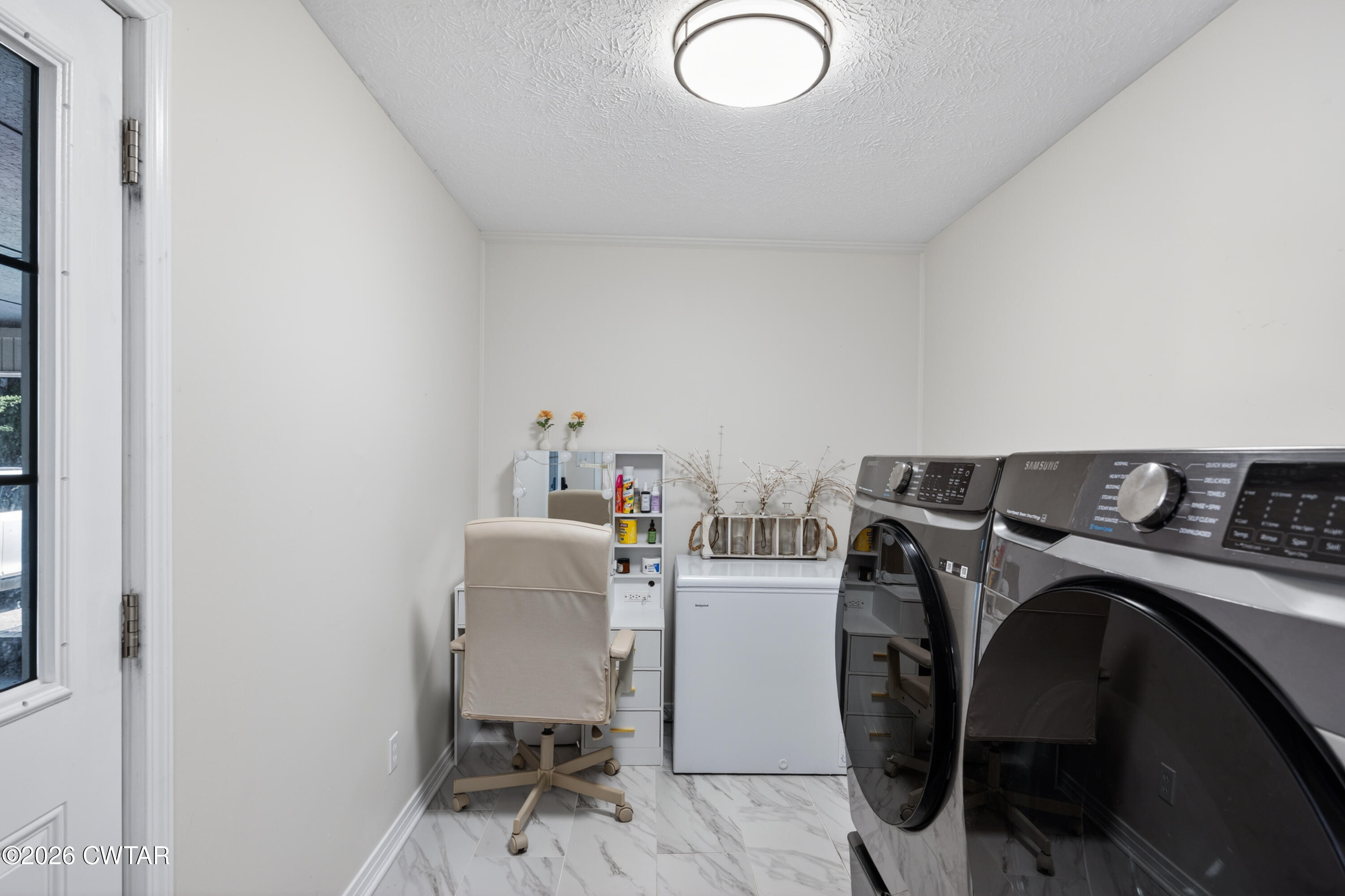 778 Mifflin Road Jackson, TN 38301 - Photo 9 of 23 a utility room with dryer and washer