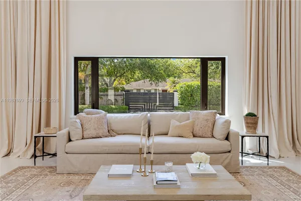 a kitchen with a white cabinets and white appliances
