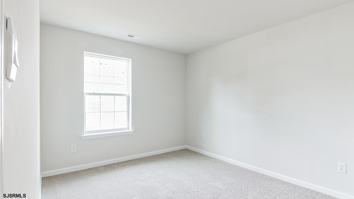 103 West Drumbed Road Villas, NJ 08251 - Photo 13 of 23 an empty room with a window