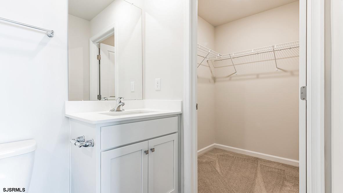 103 West Drumbed Road Villas, NJ 08251 - Photo 17 of 23 a bathroom with a sink and mirror