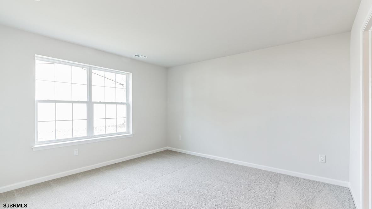 103 West Drumbed Road Villas, NJ 08251 - Photo 18 of 23 an empty room with a window