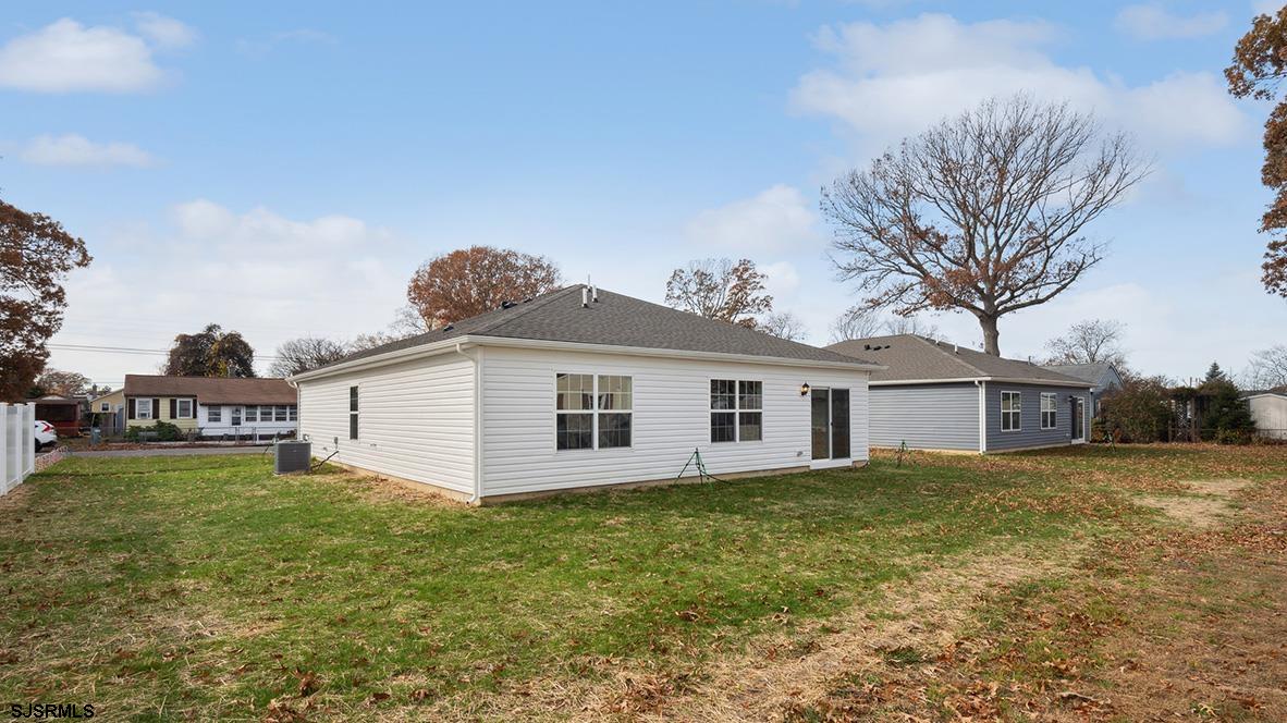 103 West Drumbed Road Villas, NJ 08251 - Photo 8 of 23 a view of a house with a yard