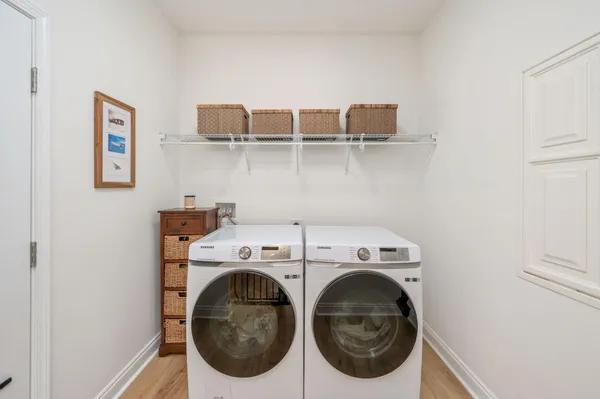 a utility room with dryer and washer
