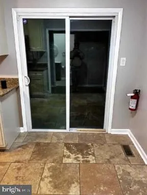 a view of a entryway door of the house