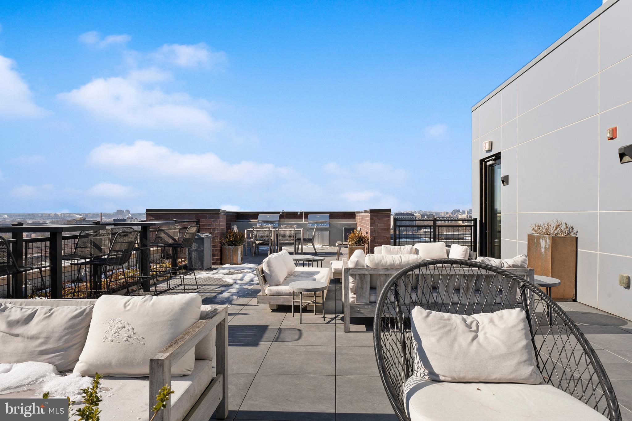 37 L Street Southeast, Unit 908 Washington, DC 20003 - Photo 9 of 20 a view of a terrace with furniture