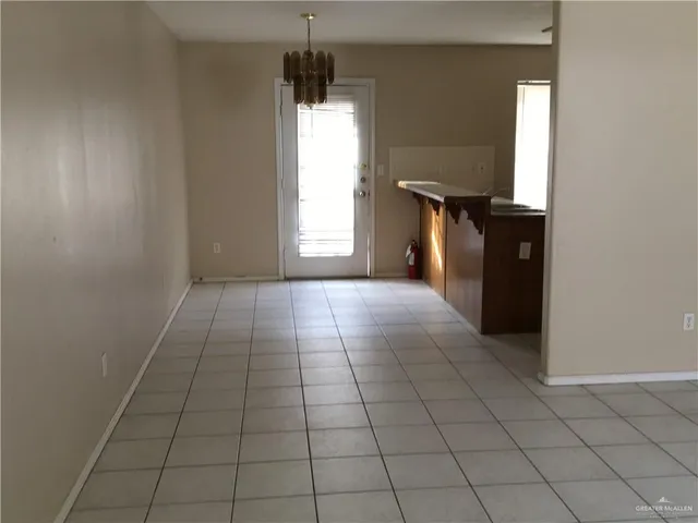 an entryway with a window in a room