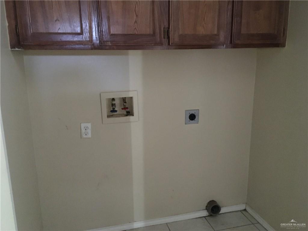 2002 Angus Street Mission, TX 78572 - Photo 8 of 9 a view of a storage and cabinets