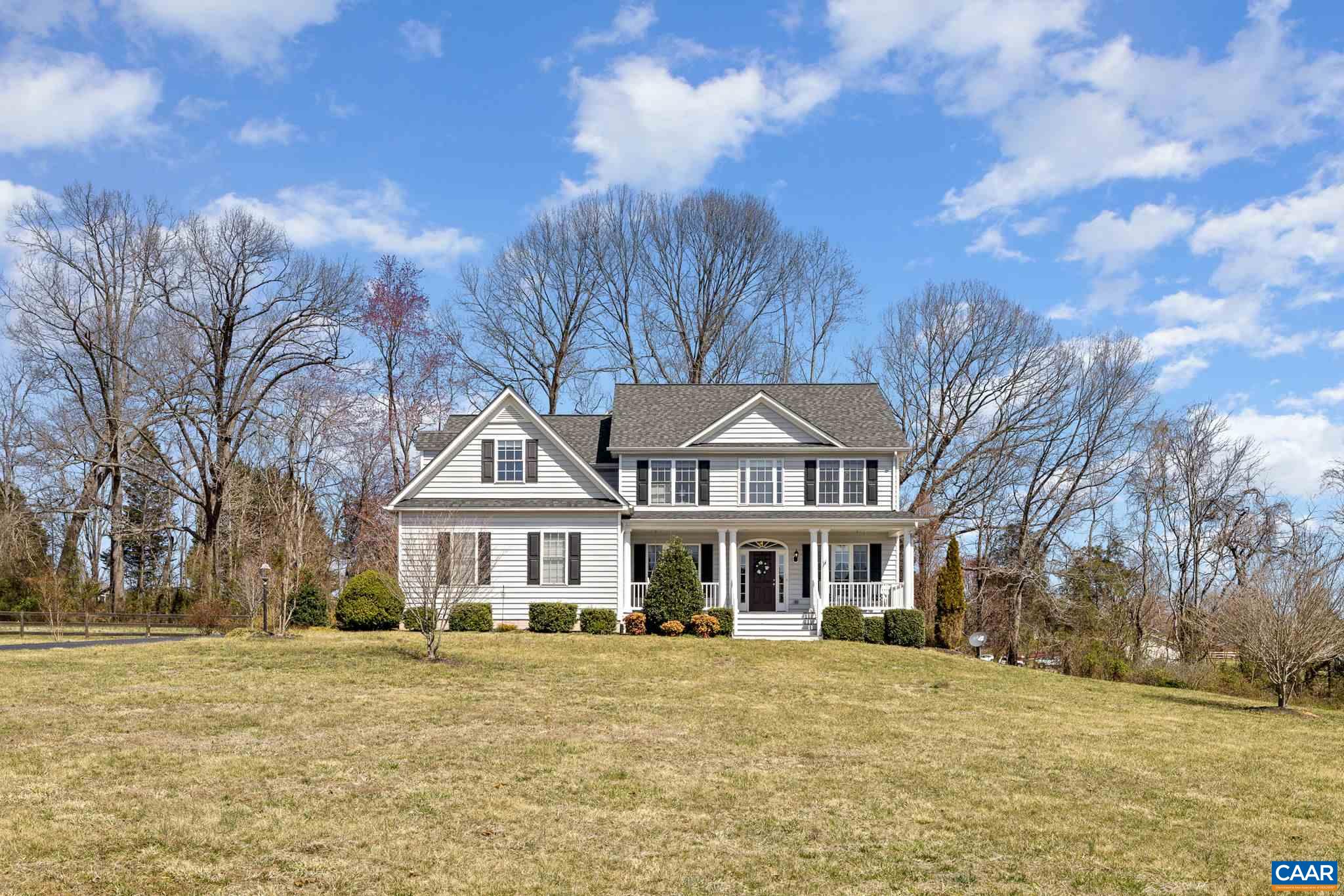 212 Wexford Ridge Road Ruckersville, VA 22968 - Photo 11 of 73 a front view of a house with a garden