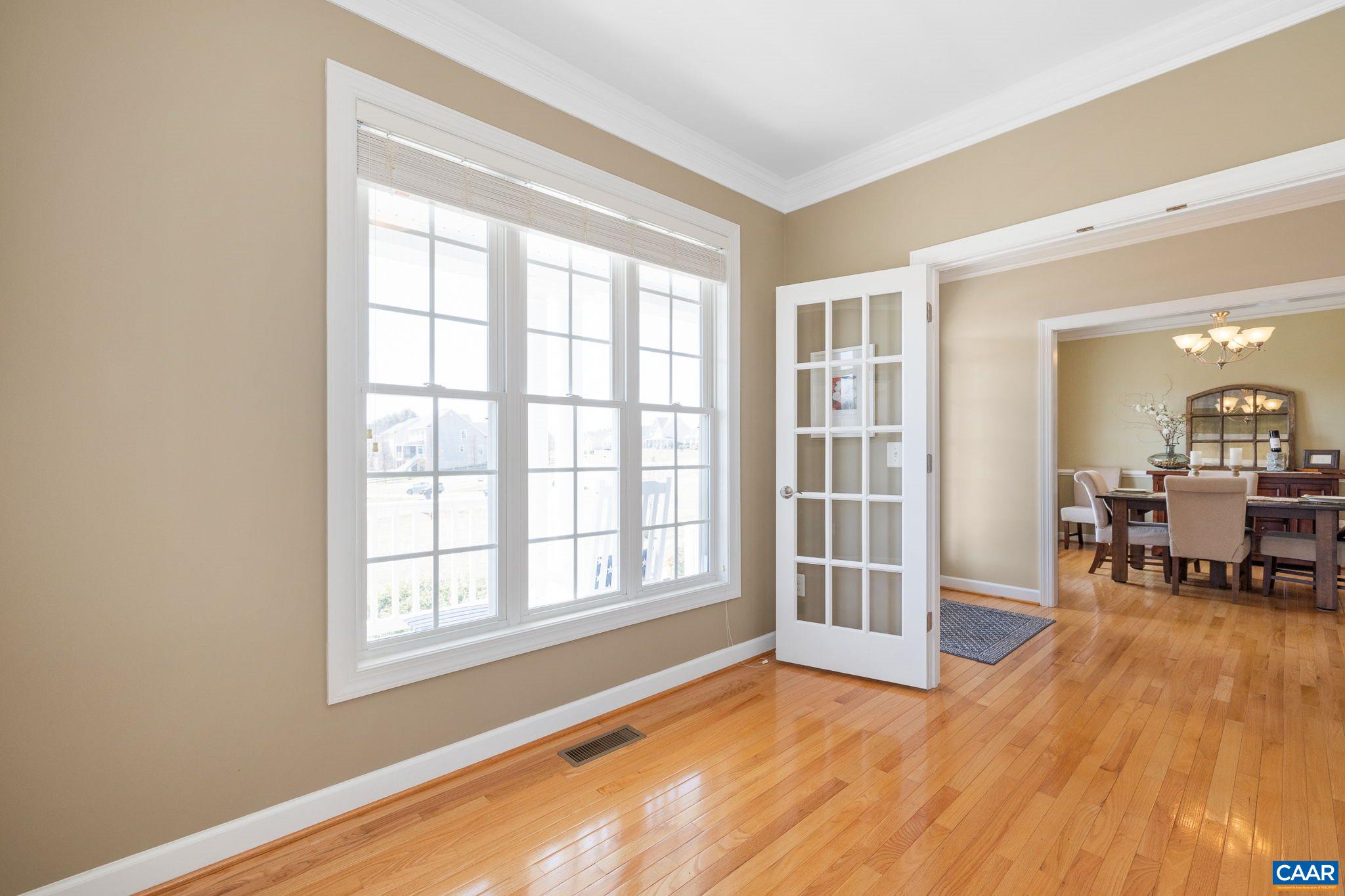 212 Wexford Ridge Road Ruckersville, VA 22968 - Photo 18 of 73 wooden floor in an empty room with a window