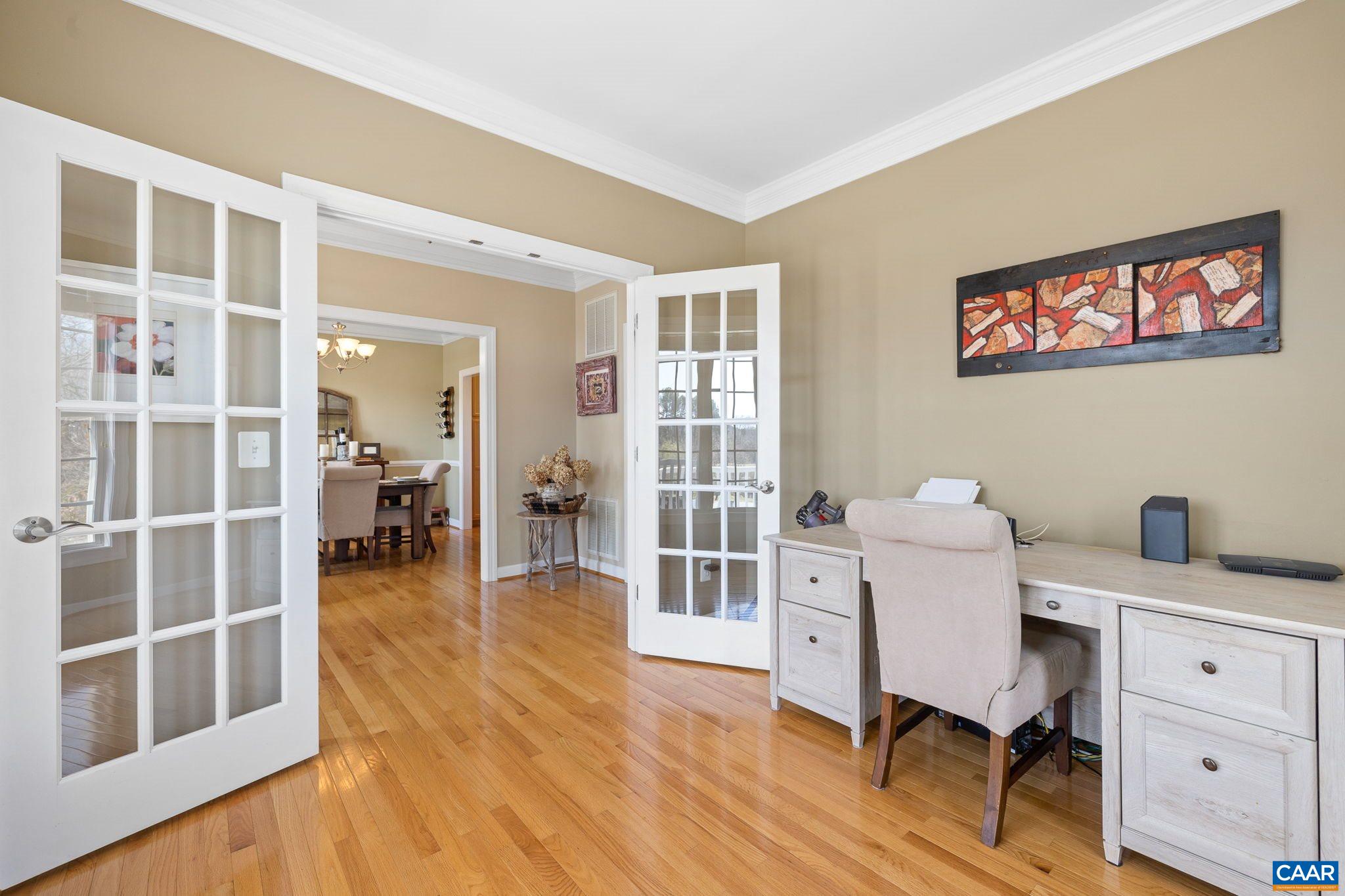 212 Wexford Ridge Road Ruckersville, VA 22968 - Photo 19 of 73 a view of a workspace with furniture and wooden floor