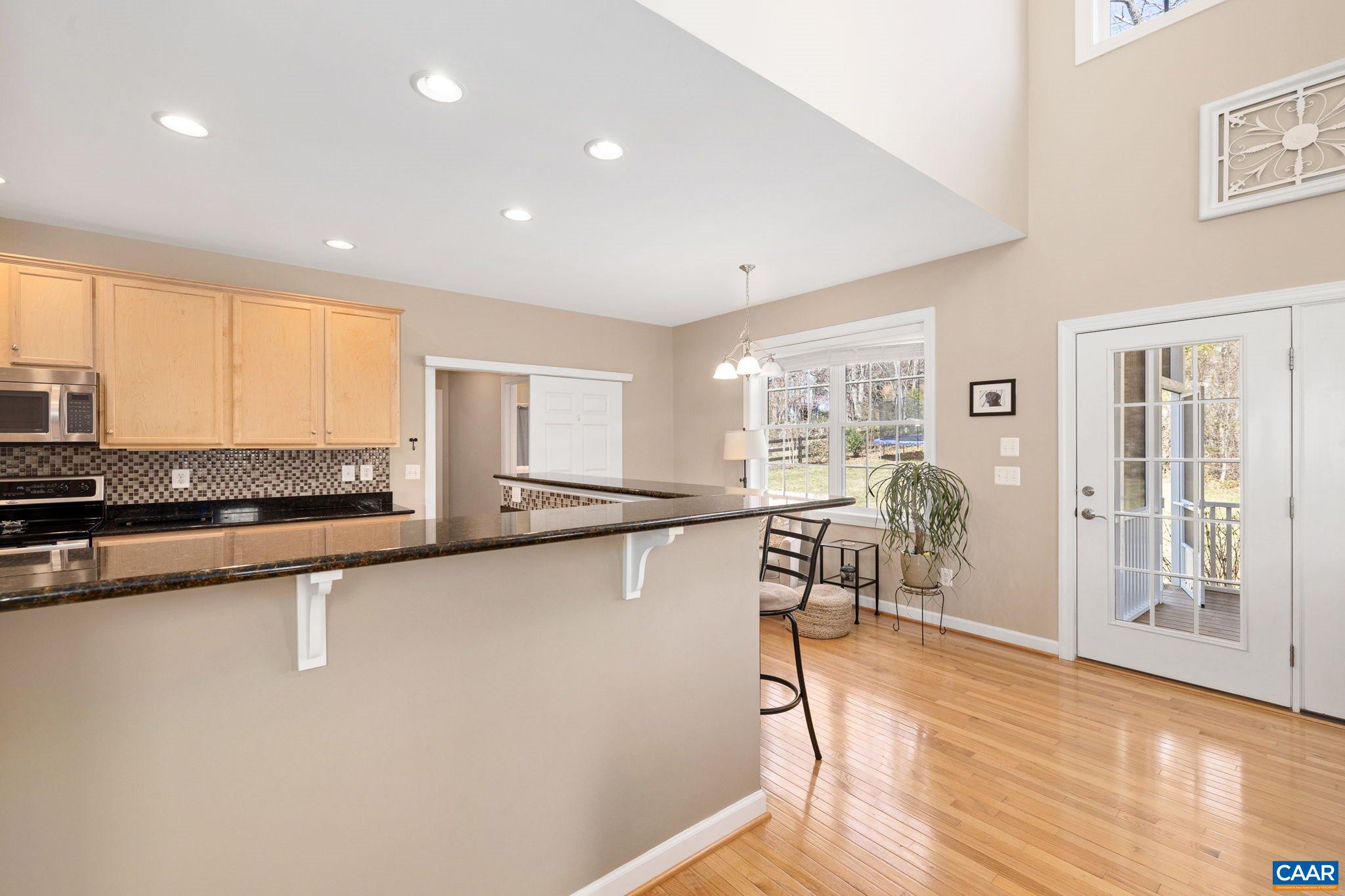212 Wexford Ridge Road Ruckersville, VA 22968 - Photo 35 of 73 a very nice looking living room with wooden floor and a window