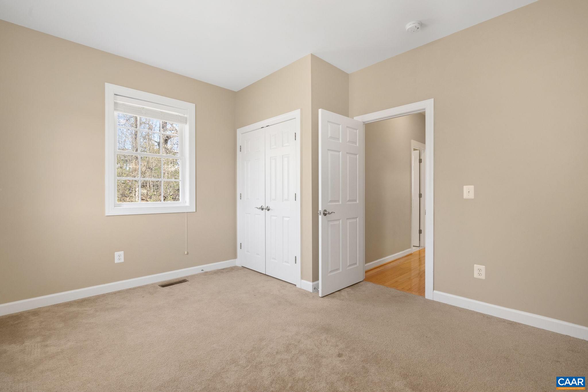 212 Wexford Ridge Road Ruckersville, VA 22968 - Photo 45 of 73 an empty room with windows and closet