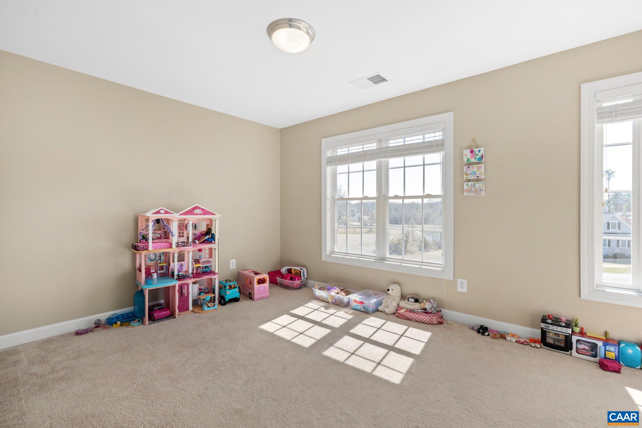 212 Wexford Ridge Road Ruckersville, VA 22968 - Photo 47 of 73 a living room with furniture and a window