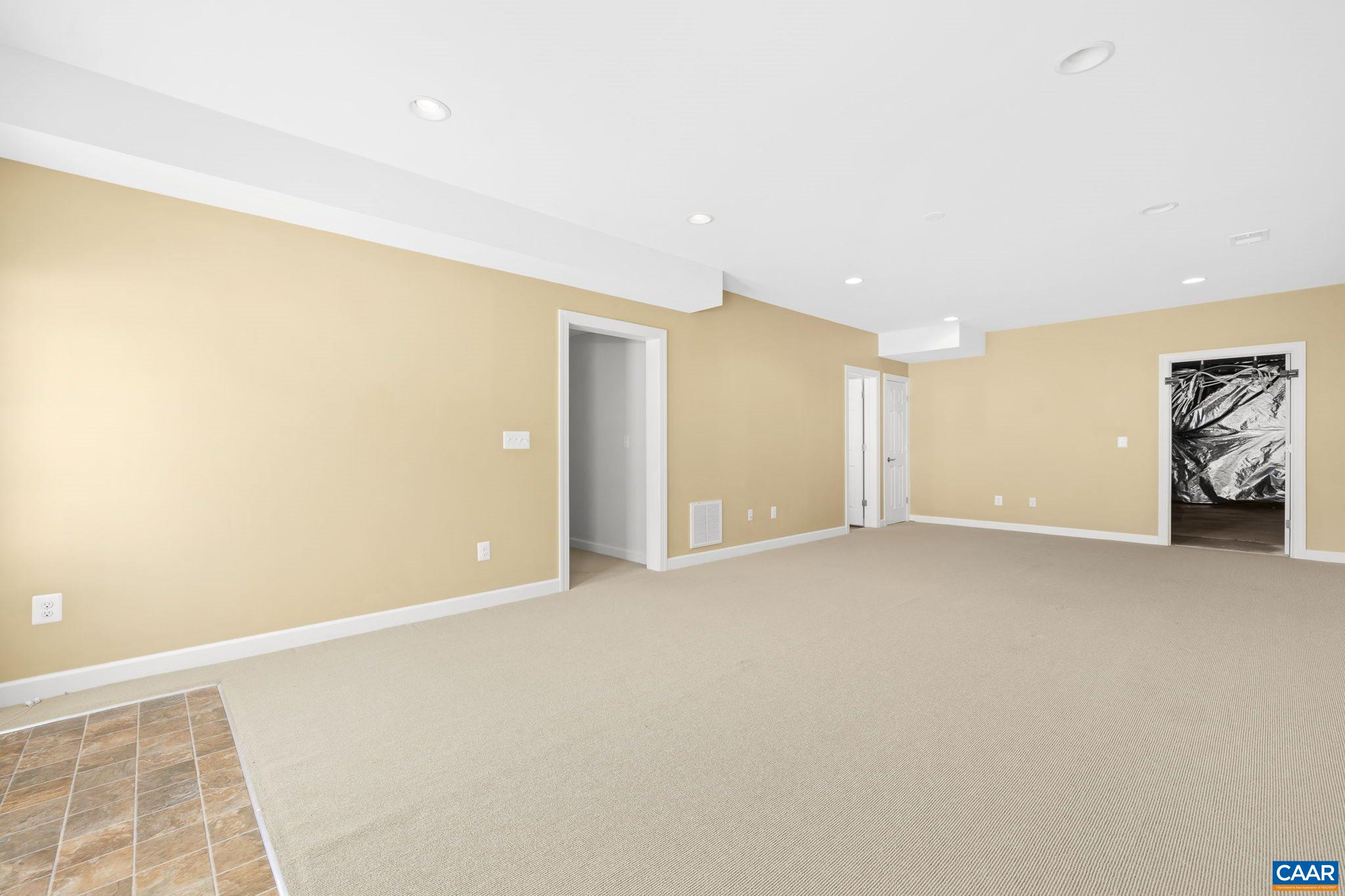 212 Wexford Ridge Road Ruckersville, VA 22968 - Photo 61 of 73 a view of an empty room with a window