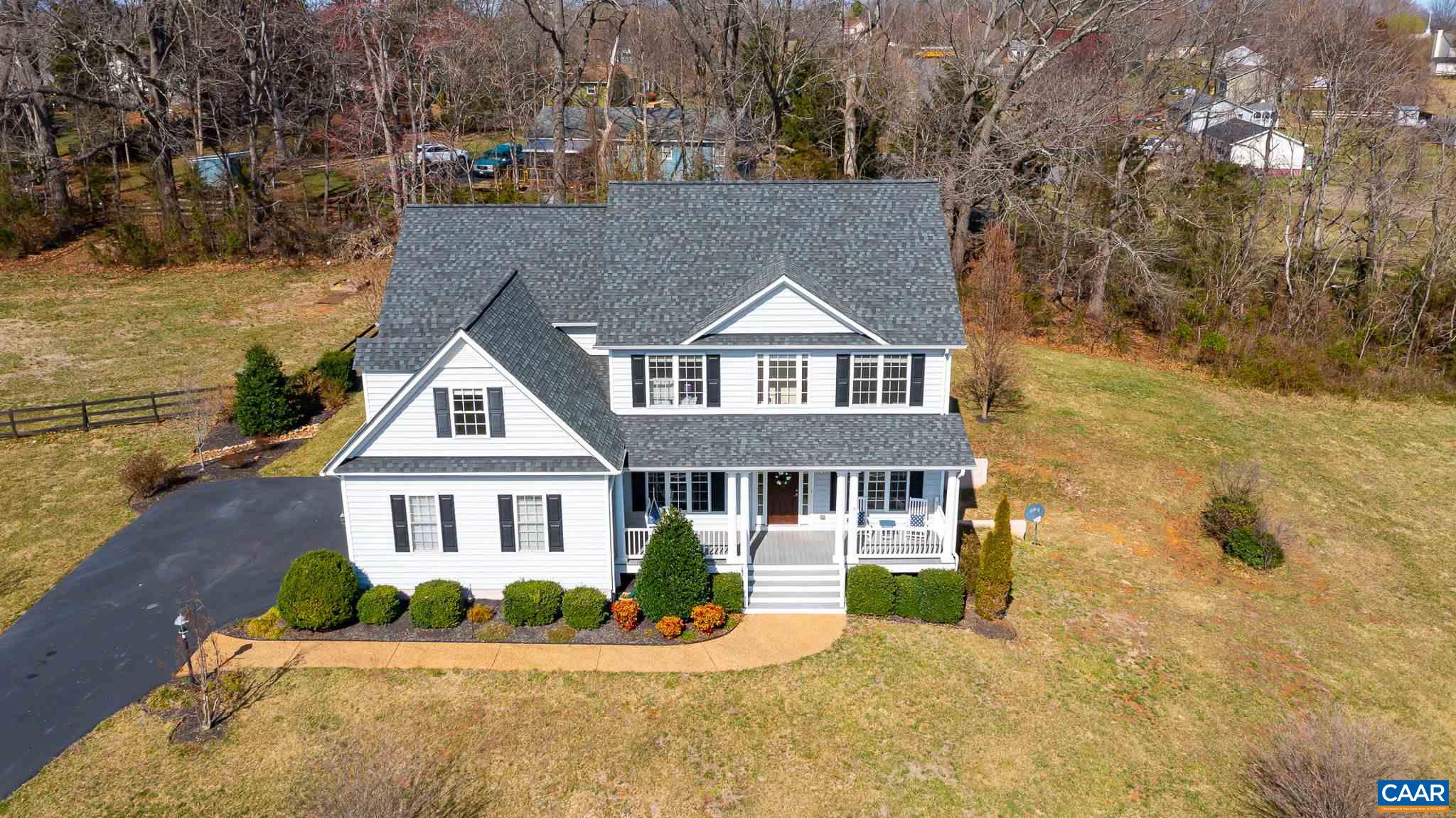 212 Wexford Ridge Road Ruckersville, VA 22968 - Photo 70 of 73 a front view of a house with a yard