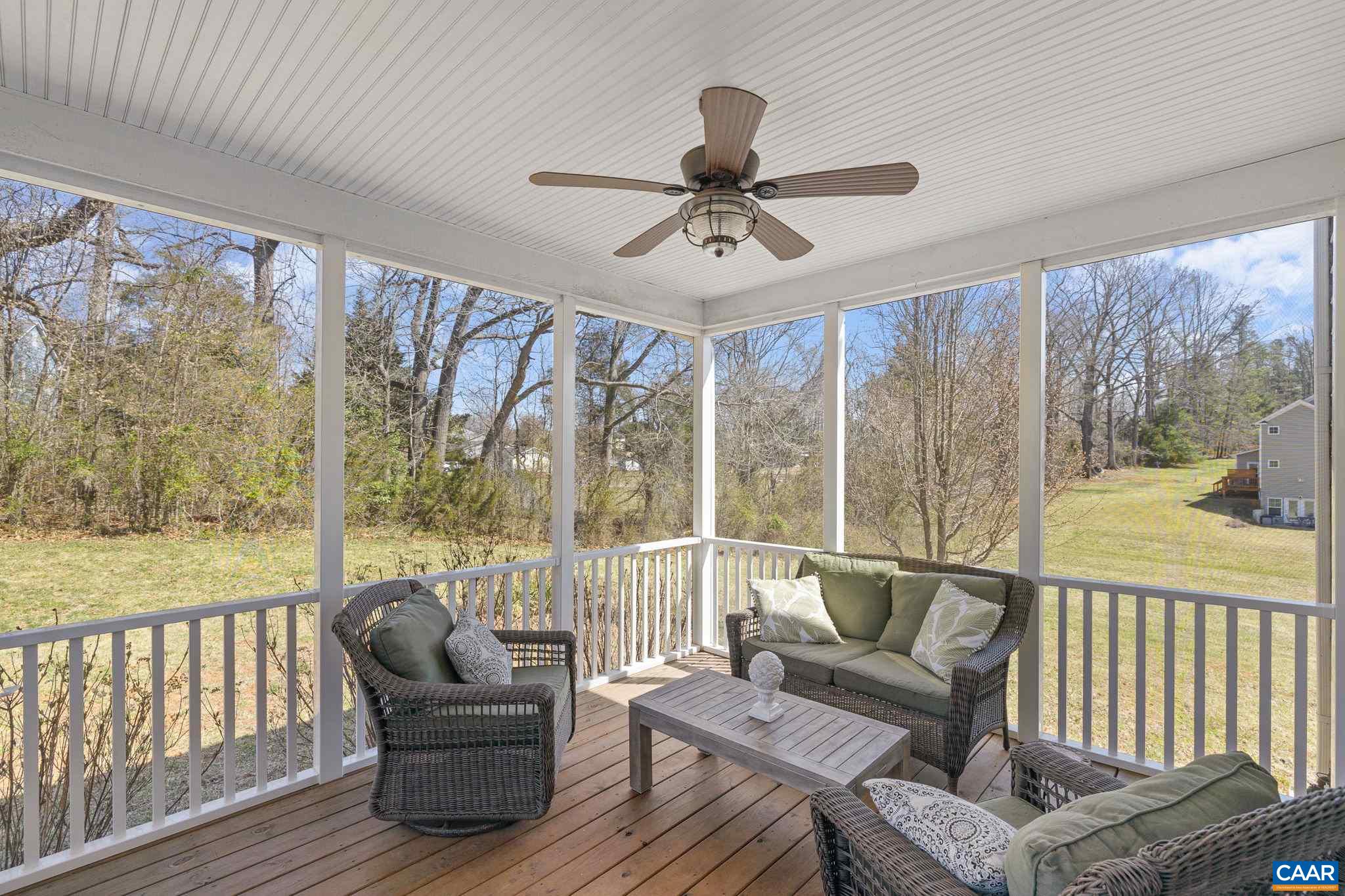 212 Wexford Ridge Road Ruckersville, VA 22968 - Photo 7 of 73 a living room with furniture and a floor to ceiling window