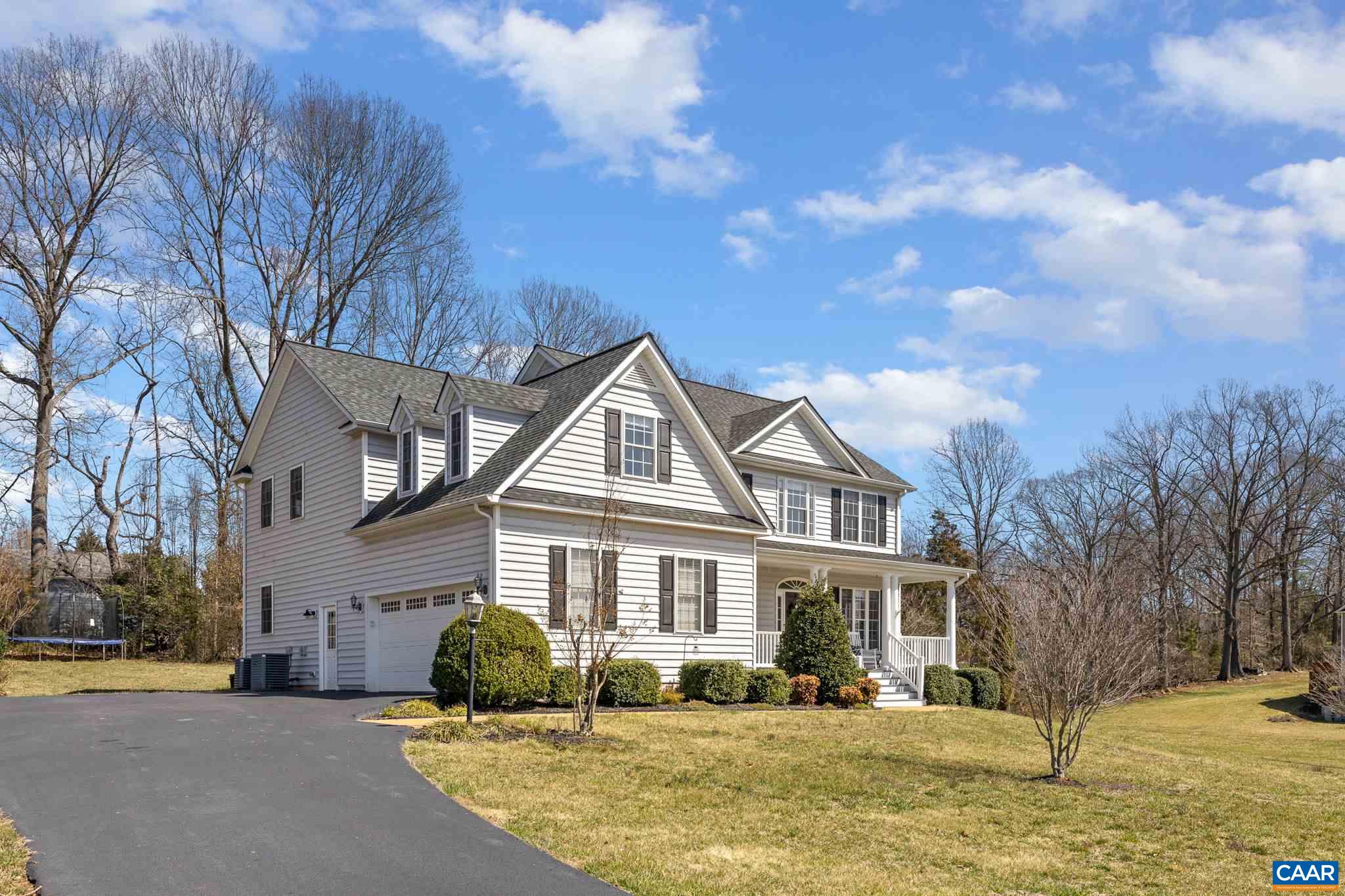 212 Wexford Ridge Road Ruckersville, VA 22968 - Photo 10 of 73 a front view of a house with a yard