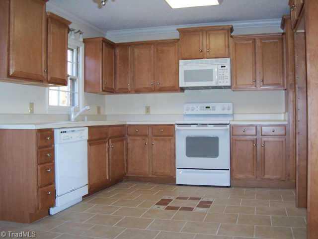 1108 Robin Hood Road High Point, NC 27262 - Photo 4 of 9 Other. Completely remodeled kitchen with new cabinets, appliances, tile floor and countertops
