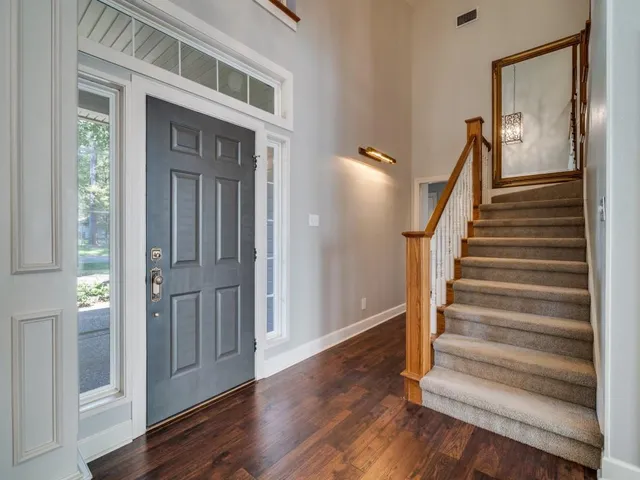 a view of entryway with wooden floor
