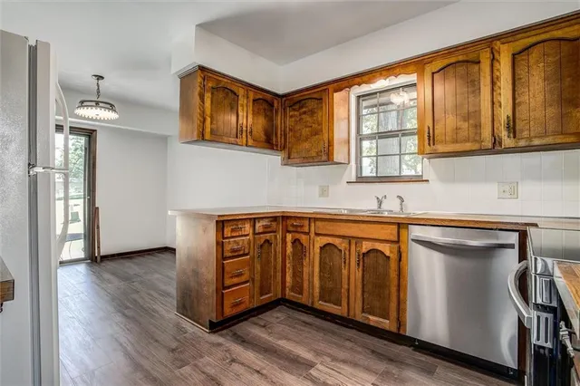 $300,000 | 308 Southwest Woods Chapel Road, Blue Springs, MO 64015