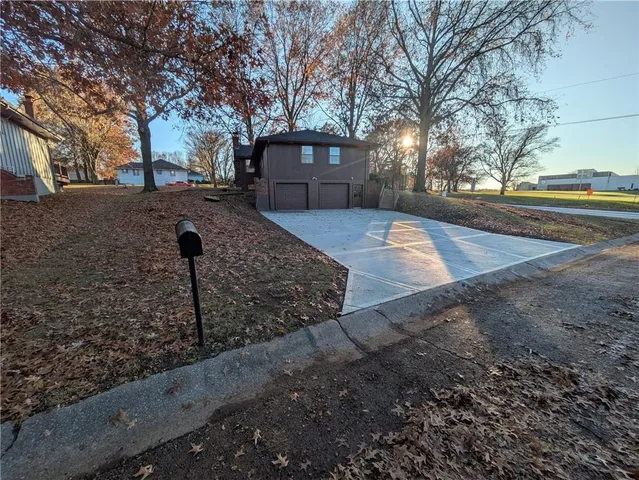 $300,000 | 308 Southwest Woods Chapel Road, Blue Springs, MO 64015