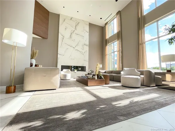 a bedroom with double bed and a couch