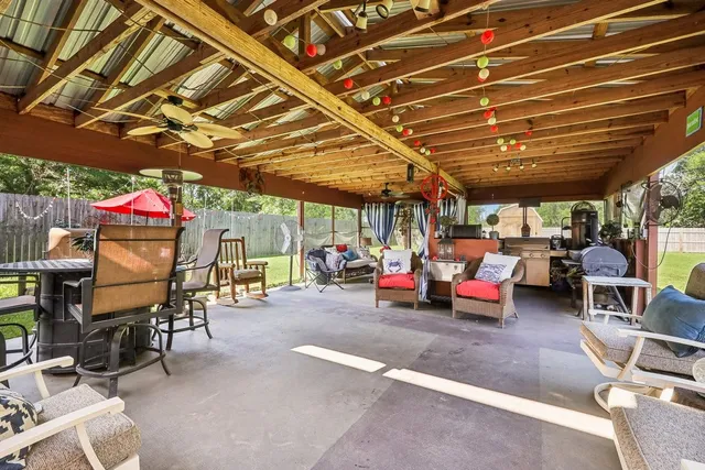 a view of a garage with a table and chairs