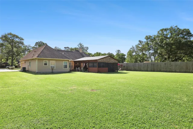 a front view of house with yard and seating area