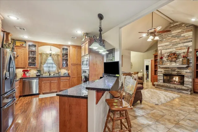a view of a kitchen and dining room