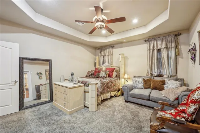 a bed room with furniture and a window