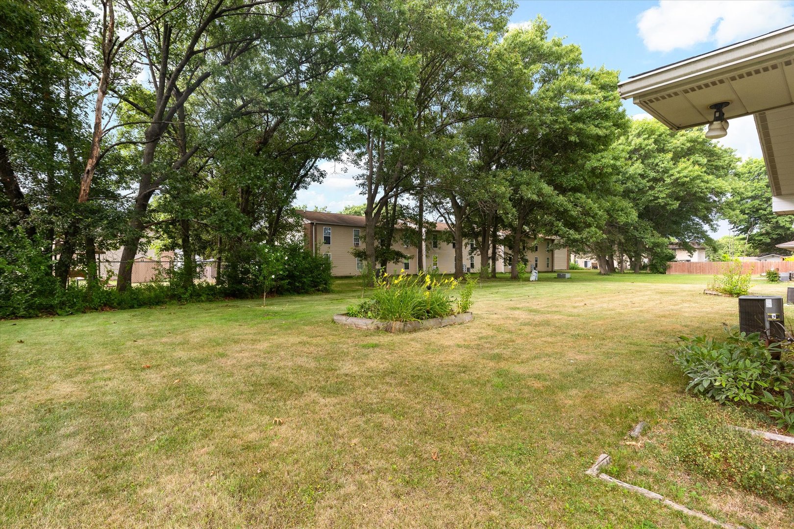 1009-1011 Dupont Avenue Morris, IL 60450 - Photo 12 of 14 a view of a trees in front of a house