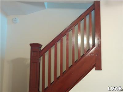 1019 Spring Street Bethlehem, PA 18018 - Photo 15 of 27 a view of staircase with railing and white walls