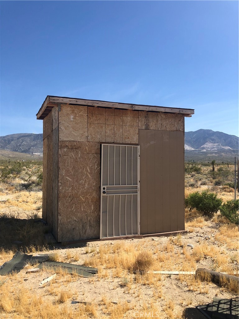 36939 Joy Road Lucerne Valley, CA 92356 - Photo 1 of 30 a view of building with a snow in the background