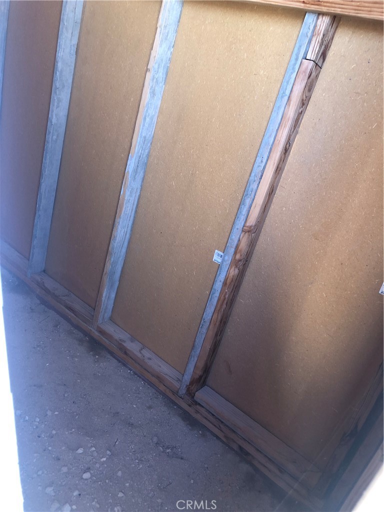 36939 Joy Road Lucerne Valley, CA 92356 - Photo 28 of 30 a view of a hallway with stairs