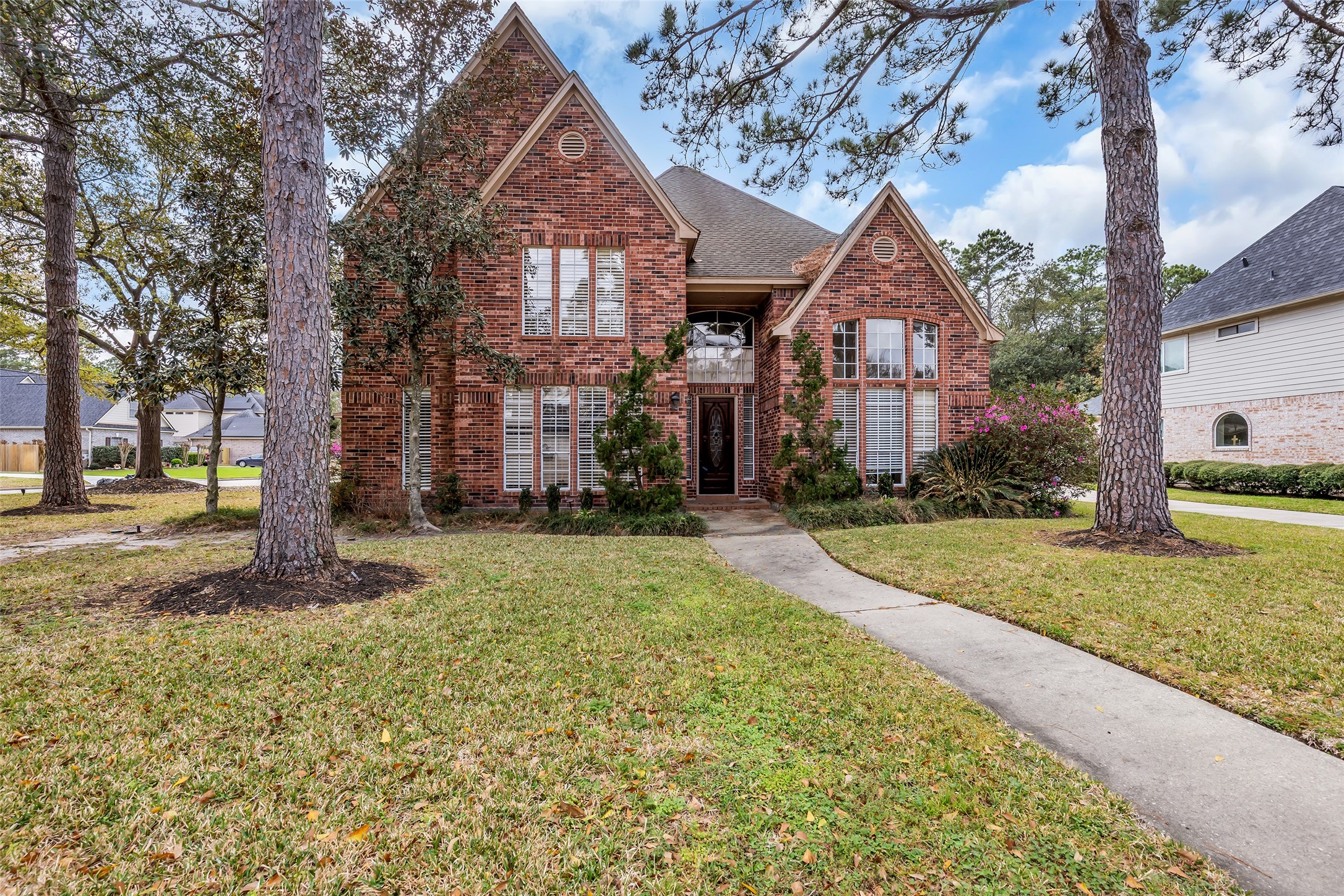 17703 Forest Park Lane Spring, TX 77379 - Photo 2 of 40 a front view of house with yard