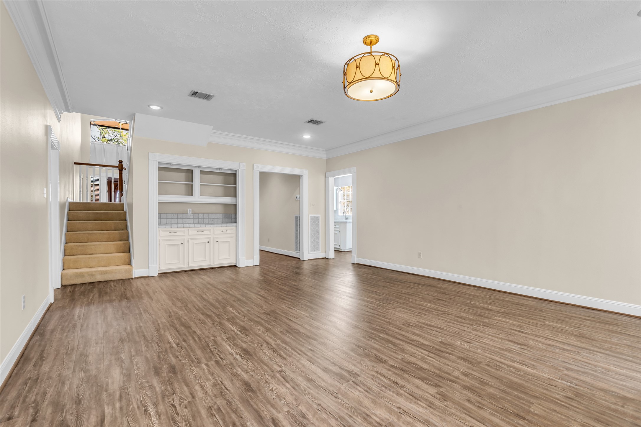17703 Forest Park Lane Spring, TX 77379 - Photo 24 of 40 an empty room with wooden floor and window