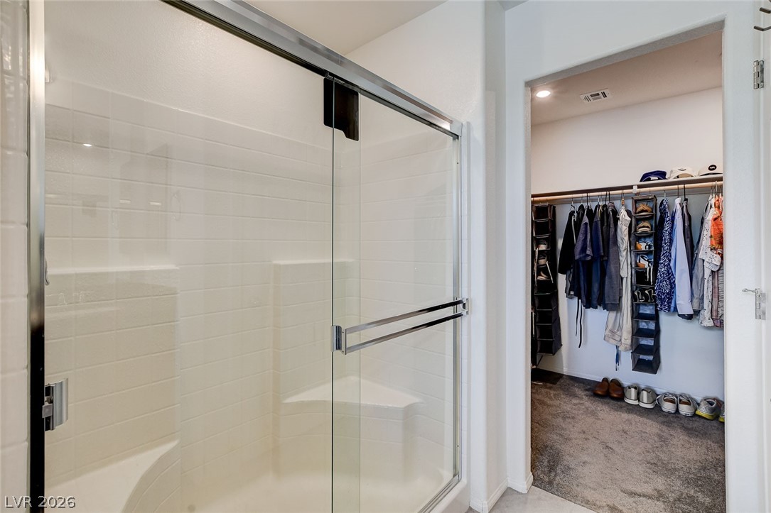 484 Filaree Place Henderson, NV 89015 - Photo 51 of 71 This primary bath features a convenient shower and an organized walk-in closet.
