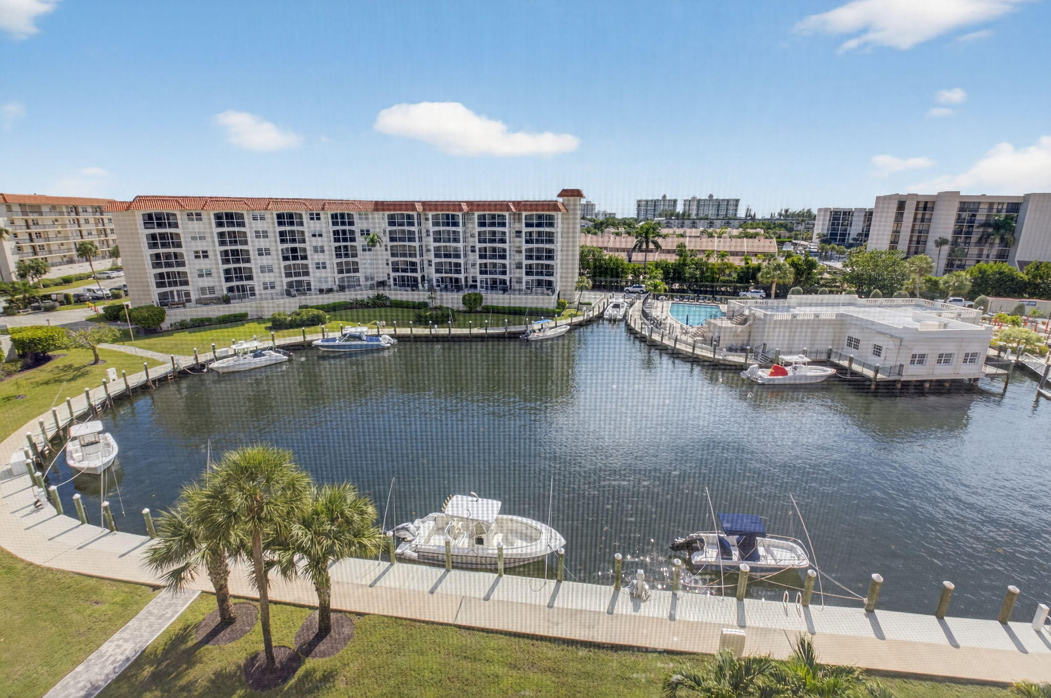 2871 North Ocean Boulevard, Unit V543 Boca Raton, FL 33431 - Photo 23 of 62 a view of a lake with tall buildings