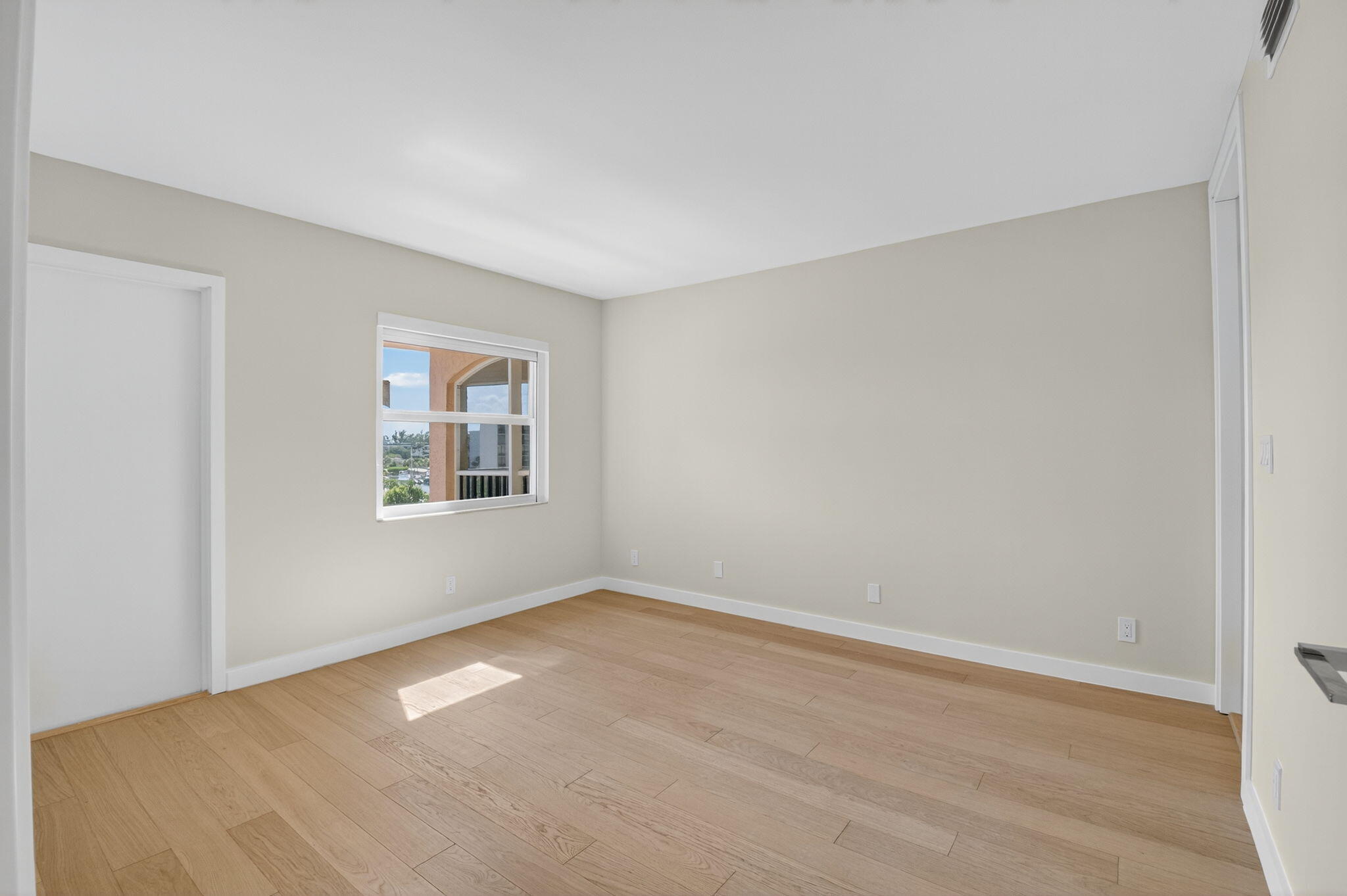 2871 North Ocean Boulevard, Unit V543 Boca Raton, FL 33431 - Photo 24 of 62 a view of an empty room with a window