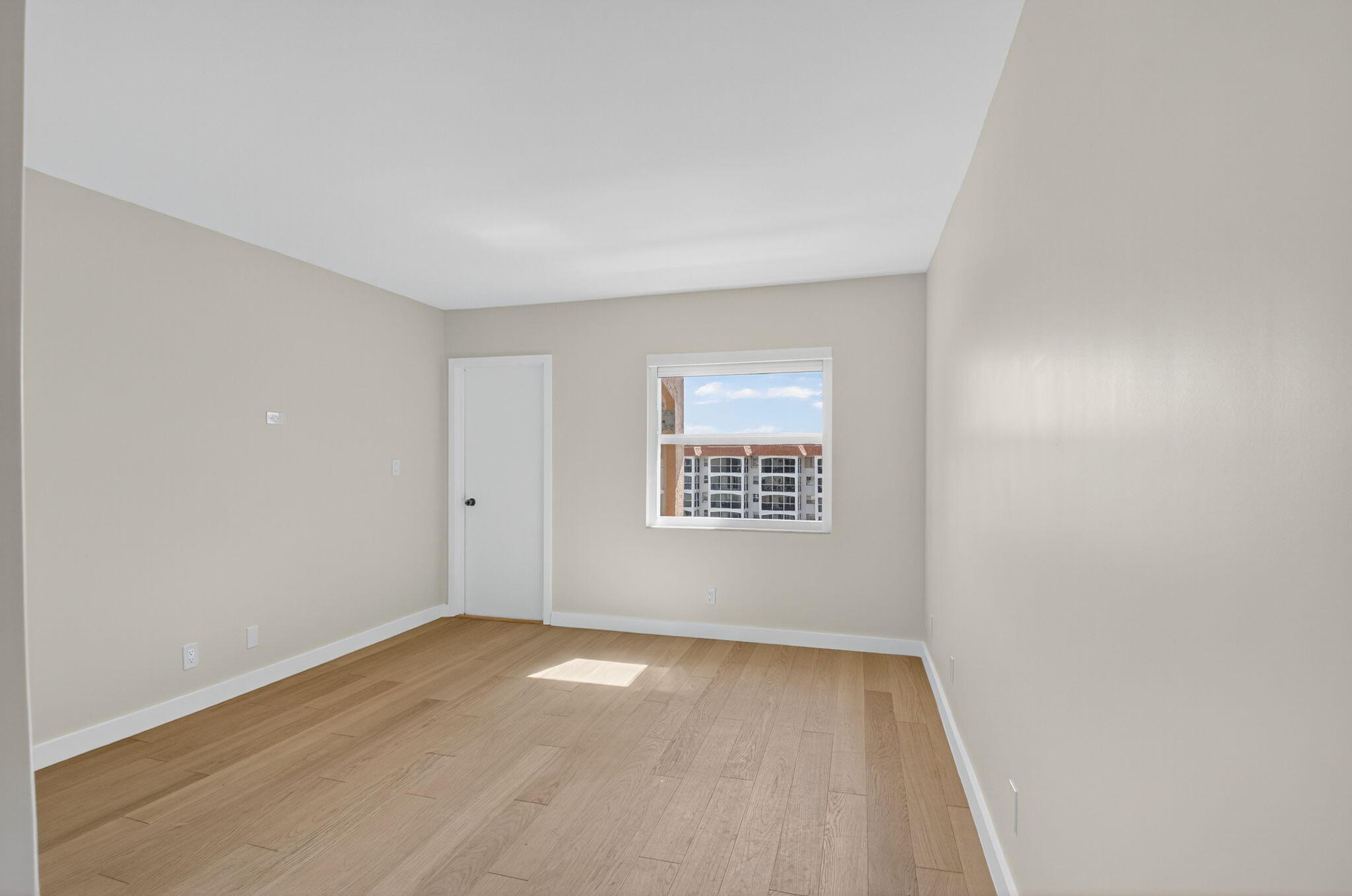 2871 North Ocean Boulevard, Unit V543 Boca Raton, FL 33431 - Photo 25 of 62 an empty room with a window