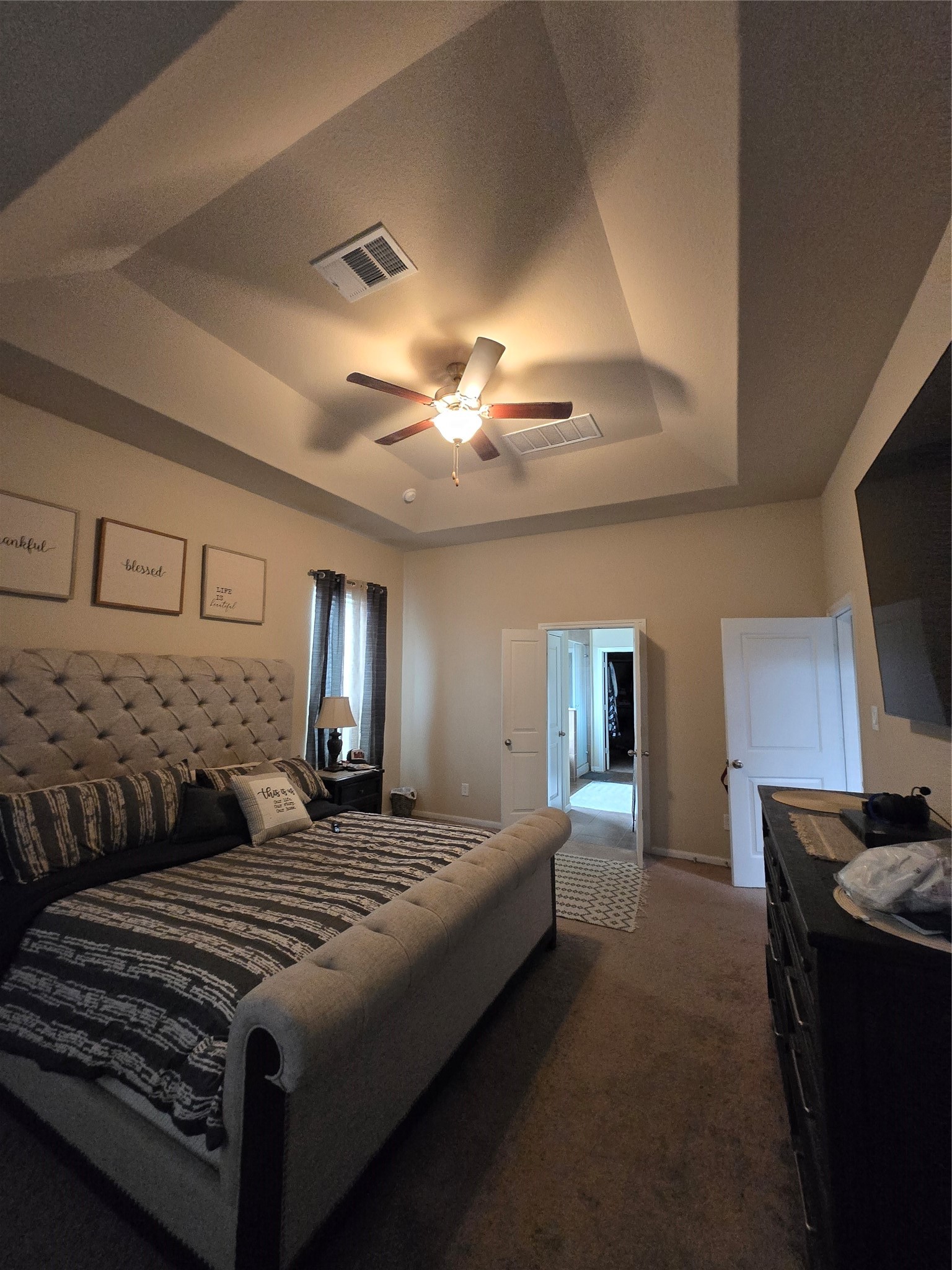 17451 Farm Pasture Trail Hockley, TX 77447 - Photo 11 of 27 a bedroom with a bed and a flat screen tv