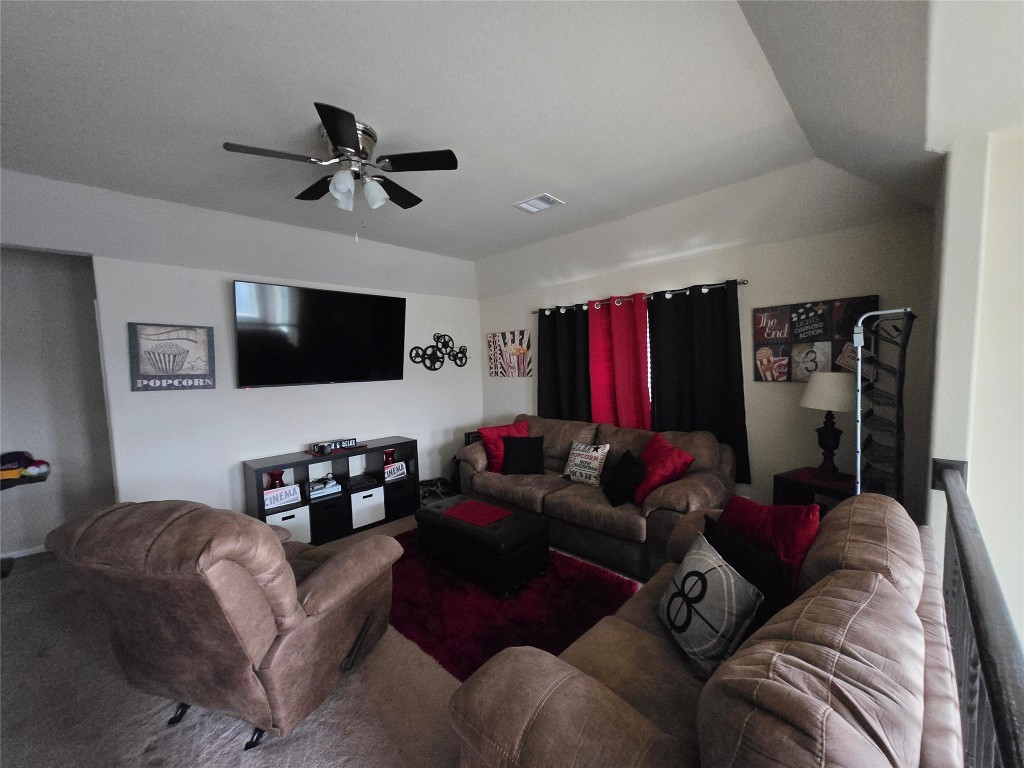 17451 Farm Pasture Trail Hockley, TX 77447 - Photo 19 of 27 a living room with furniture and a flat screen tv