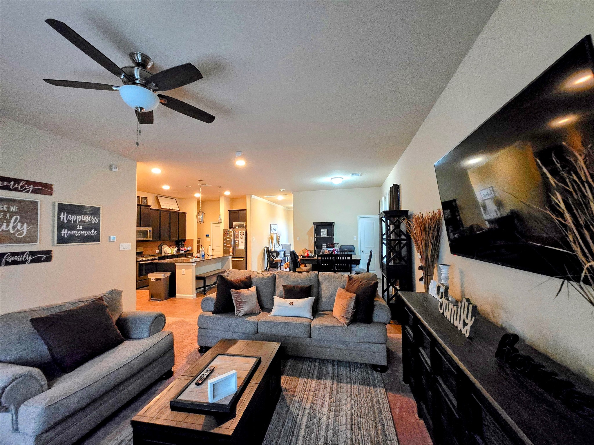 17451 Farm Pasture Trail Hockley, TX 77447 - Photo 7 of 27 a living room with furniture and a flat screen tv