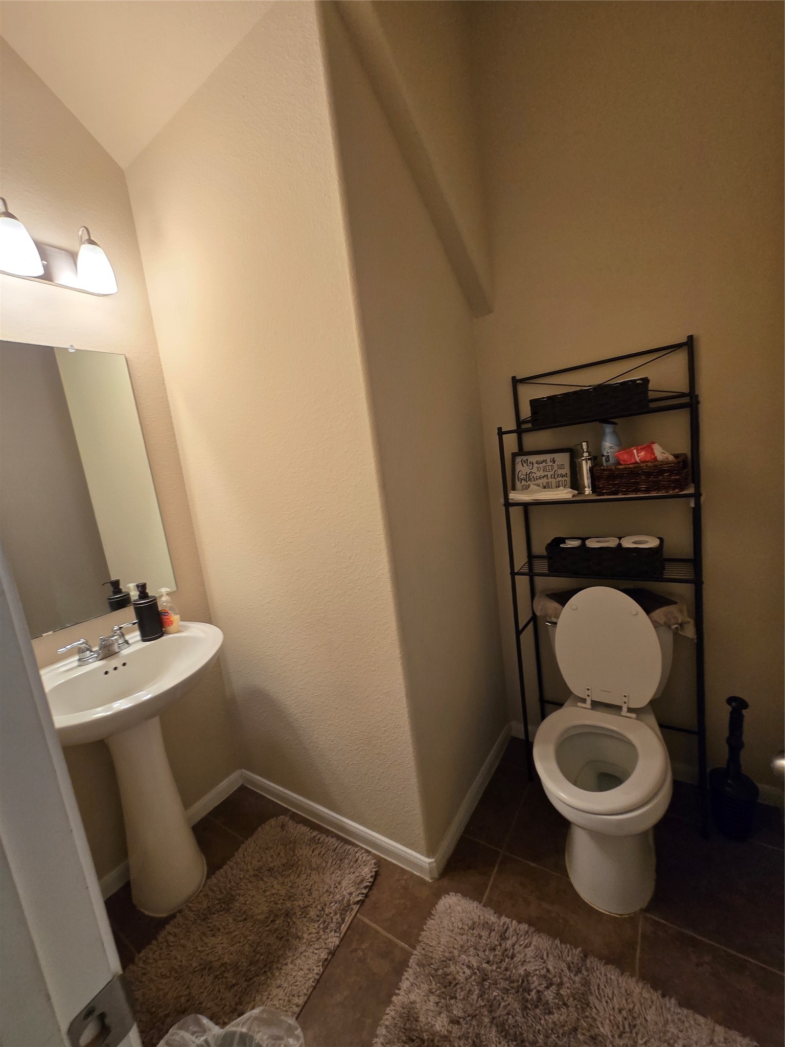 17451 Farm Pasture Trail Hockley, TX 77447 - Photo 9 of 27 a bathroom with a toilet and a sink
